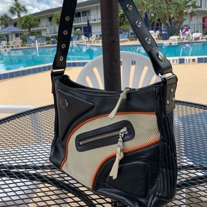 Never worn Harley purse in traditional colors